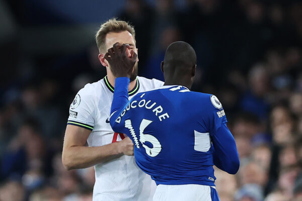 LIVERPOOL, ENGLAND - APRIL 03: Harry Kane of Tottenham Hotspur and Abdoulaye Doucoure of Everton clash during the Premier League match between Everton FC and Tottenham Hotspur at Goodison Park on April 03, 2023 in Liverpool, England. (Photo by Alex Livesey/Getty Images)