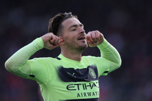 Manchester City's English midfielder Jack Grealish celebrates after scoring their second goal during the English Premier League football match between Southampton and Manchester City at St Mary's Stadium in Southampton, southern England on April 8, 2023. (Photo by Adrian DENNIS / AFP) / RESTRICTED TO EDITORIAL USE. No use with unauthorized audio, video, data, fixture lists, club/league logos or 'live' services. Online in-match use limited to 120 images. An additional 40 images may be used in extra time. No video emulation. Social media in-match use limited to 120 images. An additional 40 images may be used in extra time. No use in betting publications, games or single club/league/player publications. / (Photo by ADRIAN DENNIS/AFP via Getty Images)