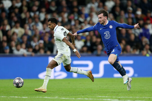 MADRID, SPAIN - APRIL 12: Rodrygo of Real Madrid is fouled by Ben Chilwell of Chelsea, which results in a Red Card for Ben Chilwell, during the UEFA Champions League quarterfinal first leg match between Real Madrid and Chelsea FC at Estadio Santiago Bernabeu on April 12, 2023 in Madrid, Spain. 