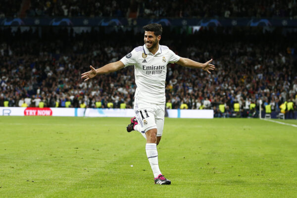 MADRID, SPAIN - APRIL 12: Marco Asensio of Real Madrid celebrates after scoring the team's second goal during the UEFA Champions League quarterfinal first leg match between Real Madrid and Chelsea FC at Estadio Santiago Bernabeu on April 12, 2023 in Madrid, Spain. 