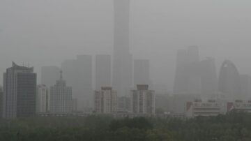 中国江南泥雨来袭 北京遭遇“回锅沙”