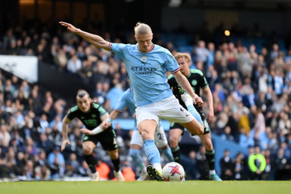 MANCHESTER, ENGLAND - APRIL 15: Erling Haaland of Manchester City scores the team's second goal from the penalty spot during the Premier League match between Manchester City and Leicester City at Etihad Stadium on April 15, 2023 in Manchester, England. 