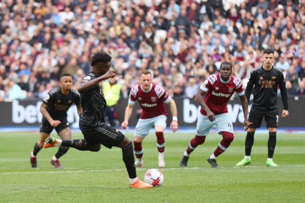 LONDON, ENGLAND - APRIL 16: Bukayo Saka of Arsenal takes a penalty which misses during the Premier League match between West Ham United and Arsenal FC at London Stadium on April 16, 2023 in London, England. 