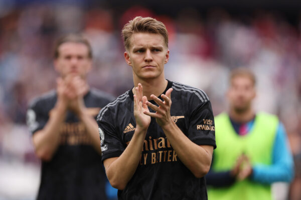 LONDON, ENGLAND - APRIL 16: Martin Odegaard of Arsenal acknowledges the fans following the Premier League match between West Ham United and Arsenal FC at London Stadium on April 16, 2023 in London, England. 