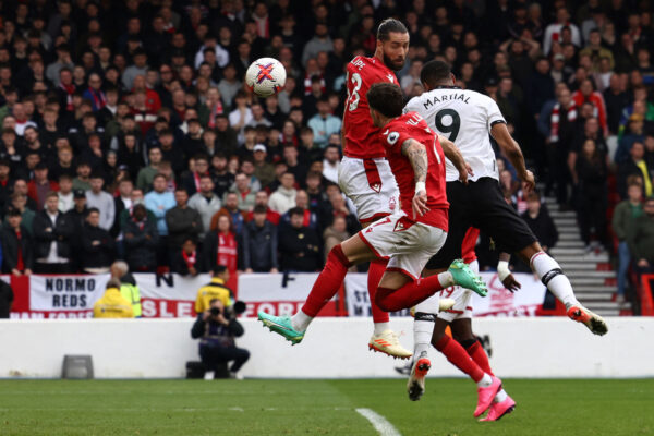 Manchester United's French striker Anthony Martial (R) directs this headed attempt wide of the goal during the English Premier League football match between Nottingham Forest and Manchester United at The City Ground in Nottingham, central England, on April 16, 2023. (Photo by DARREN STAPLES / AFP) / RESTRICTED TO EDITORIAL USE. No use with unauthorized audio, video, data, fixture lists, club/league logos or 'live' services. Online in-match use limited to 120 images. An additional 40 images may be used in extra time. No video emulation. Social media in-match use limited to 120 images. An additional 40 images may be used in extra time. No use in betting publications, games or single club/league/player publications. / 