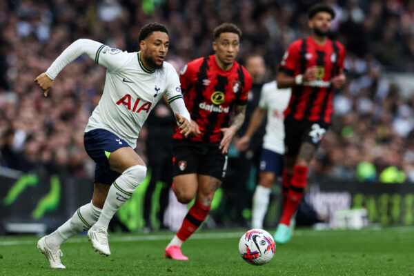 Tottenham Hotspur's Dutch midfielder Arnaut Danjuma (L) controls the ball during the English Premier League football match between Tottenham Hotspur and Bournemouth at Tottenham Hotspur Stadium in London, on April 15, 2023. (Photo by Adrian DENNIS / AFP) / RESTRICTED TO EDITORIAL USE. No use with unauthorized audio, video, data, fixture lists, club/league logos or 'live' services. Online in-match use limited to 120 images. An additional 40 images may be used in extra time. No video emulation. Social media in-match use limited to 120 images. An additional 40 images may be used in extra time. No use in betting publications, games or single club/league/player publications. / 