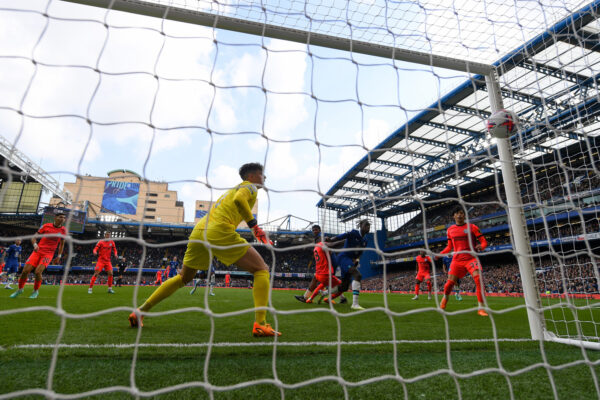 LONDON, ENGLAND - APRIL 15: Danny Welbeck of Brighton & Hove Albion equalises as Kepa Arrizabalaga of Chelsea is rooted to the spot during the Premier League match between Chelsea FC and Brighton & Hove Albion at Stamford Bridge on April 15, 2023 in London, England. 