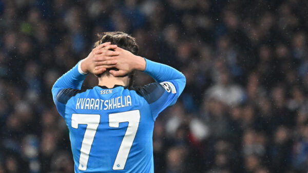 Napoli's Georgian forward Khvicha Kvaratskhelia reacts after missing a penalty during the UEFA Champions League quarter-finals second leg football match between SSC Napoli and AC Milan on April 18, 2023 at the Diego-Maradona stadium in Naples. (Photo by Alberto PIZZOLI / AFP) 