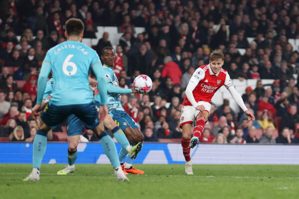 LONDON, ENGLAND - APRIL 21: Martin Odegaard of Arsenal scores the team's second goal during the Premier League match between Arsenal FC and Southampton FC at Emirates Stadium on April 21, 2023 in London, England. 