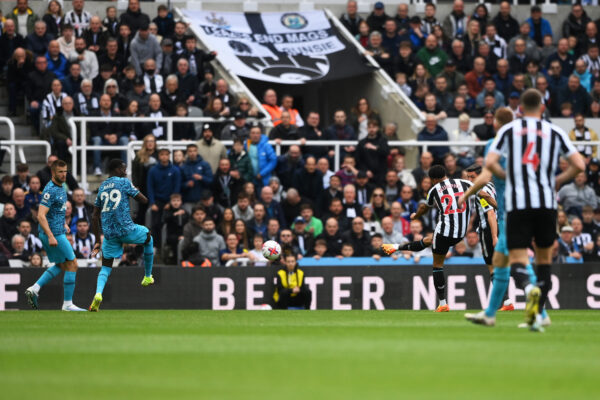 NEWCASTLE UPON TYNE, ENGLAND - APRIL 23: Jacob Murphy of Newcastle United scores the team's third goal during the Premier League match between Newcastle United and Tottenham Hotspur at St. James Park on April 23, 2023 in Newcastle upon Tyne, England. 