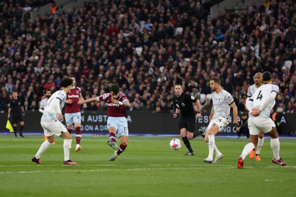 LONDON, ENGLAND - APRIL 26: Lucas Paqueta of West Ham United scores the team's first goal during the Premier League match between West Ham United and Liverpool FC at London Stadium on April 26, 2023 in London, England. 