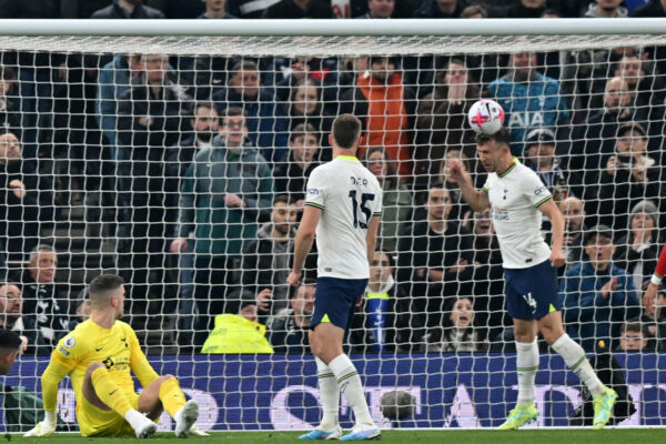 Tottenham Hotspur's Croatian midfielder Ivan Perisic (R) heads the ball off the line during the English Premier League football match between Tottenham Hotspur and Manchester United at Tottenham Hotspur Stadium in London, on April 27, 2023. (Photo by Glyn KIRK / AFP) / RESTRICTED TO EDITORIAL USE. No use with unauthorized audio, video, data, fixture lists, club/league logos or 'live' services. Online in-match use limited to 120 images. An additional 40 images may be used in extra time. No video emulation. Social media in-match use limited to 120 images. An additional 40 images may be used in extra time. No use in betting publications, games or single club/league/player publications. / 