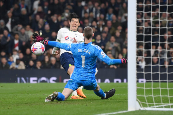 LONDON, ENGLAND - APRIL 27: Son Heung-Min of Tottenham Hotspur scores the team's second goal past David De Gea of Manchester United during the Premier League match between Tottenham Hotspur and Manchester United at Tottenham Hotspur Stadium on April 27, 2023 in London, England. 