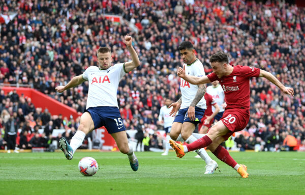 LIVERPOOL, ENGLAND - APRIL 30: Diogo Jota of Liverpool scores the team's fourth goal whilst under pressure from Eric Dier of Tottenham Hotspur during the Premier League match between Liverpool FC and Tottenham Hotspur at Anfield on April 30, 2023 in Liverpool, England. 