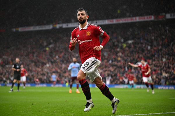 Manchester United's Portuguese midfielder Bruno Fernandes celebrates after scoring his team first goal during the English Premier League football match between Manchester United and Aston Villa at Old Trafford in Manchester, north west England, on April 30, 2023. (Photo by Oli SCARFF / AFP) / RESTRICTED TO EDITORIAL USE. No use with unauthorized audio, video, data, fixture lists, club/league logos or 'live' services. Online in-match use limited to 120 images. An additional 40 images may be used in extra time. No video emulation. Social media in-match use limited to 120 images. An additional 40 images may be used in extra time. No use in betting publications, games or single club/league/player publications. / 