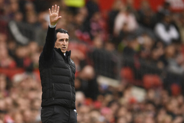 Aston Villa's Spanish head coach Unai Emery reacts during the English Premier League football match between Manchester United and Aston Villa at Old Trafford in Manchester, north west England, on April 30, 2023. (Photo by Oli SCARFF / AFP) / RESTRICTED TO EDITORIAL USE. No use with unauthorized audio, video, data, fixture lists, club/league logos or 'live' services. Online in-match use limited to 120 images. An additional 40 images may be used in extra time. No video emulation. Social media in-match use limited to 120 images. An additional 40 images may be used in extra time. No use in betting publications, games or single club/league/player publications. / 