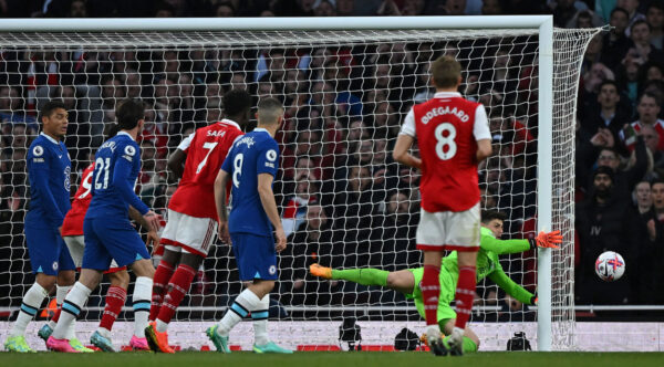 Chelsea's Spanish goalkeeper Kepa Arrizabalaga (R) saves a shot from Arsenal's Brazilian striker Gabriel Jesus (unseen) during the English Premier League football match between Arsenal and Chelsea at the Emirates Stadium, in London, on May 2, 2023. (Photo by Ben Stansall / AFP) / RESTRICTED TO EDITORIAL USE. No use with unauthorized audio, video, data, fixture lists, club/league logos or 'live' services. Online in-match use limited to 120 images. An additional 40 images may be used in extra time. No video emulation. Social media in-match use limited to 120 images. An additional 40 images may be used in extra time. No use in betting publications, games or single club/league/player publications. / 