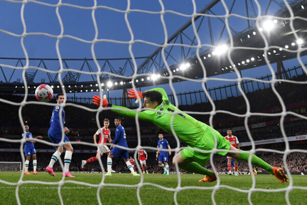 LONDON, ENGLAND - MAY 02: (EDITORS NOTE: Image has been taken using a Remote Camera behind the Goal.) A general view as Martin Odegaard of Arsenal scores the team's second goal as Kepa Arrizabalaga of Chelsea fails to make save during the Premier League match between Arsenal FC and Chelsea FC at Emirates Stadium on May 02, 2023 in London, England. 