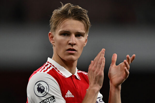 Arsenal's Norwegian midfielder Martin Odegaard applauds the fans following the English Premier League football match between Arsenal and Chelsea at the Emirates Stadium, in London, on May 2, 2023. - Arsenal won the match 3-1. (Photo by Ben Stansall / AFP) / RESTRICTED TO EDITORIAL USE. No use with unauthorized audio, video, data, fixture lists, club/league logos or 'live' services. Online in-match use limited to 120 images. An additional 40 images may be used in extra time. No video emulation. Social media in-match use limited to 120 images. An additional 40 images may be used in extra time. No use in betting publications, games or single club/league/player publications. / 