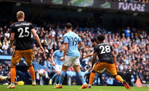 MANCHESTER, ENGLAND - MAY 06: Ilkay Guendogan of Manchester City scores their sides second goal during the Premier League match between Manchester City and Leeds United at Etihad Stadium on May 06, 2023 in Manchester, England. 