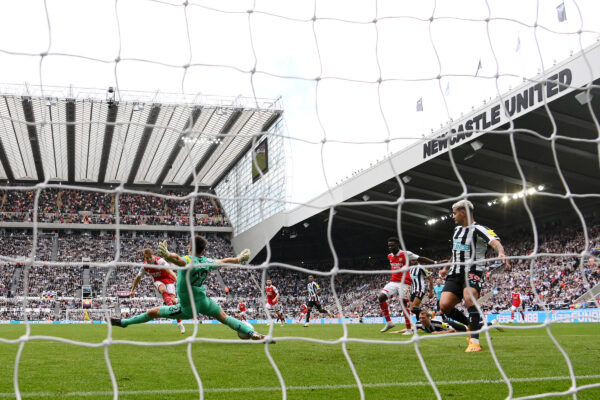 NEWCASTLE UPON TYNE, ENGLAND - MAY 07: (EDITORS NOTE: Image has been taken using a Remote Camera behind the Goal.) A general view as Nick Pope of Newcastle United saves a shot from Martin Odegaard of Arsenal during the Premier League match between Newcastle United and Arsenal FC at St. James Park on May 07, 2023 in Newcastle upon Tyne, England. 