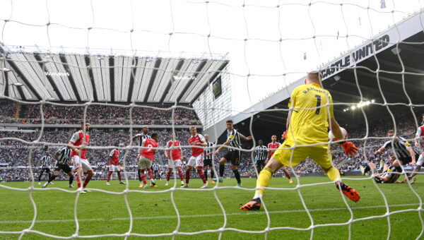 NEWCASTLE UPON TYNE, ENGLAND - MAY 07: Newcastle player Fabian Schar (c) has a header saved by Arsenal goalkeeper Aaron Ramsdale during the Premier League match between Newcastle United and Arsenal FC at St. James Park on May 07, 2023 in Newcastle upon Tyne, England. 