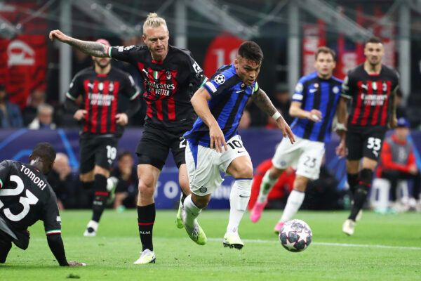 MILAN, ITALY - MAY 10: Lautaro Martinez of FC Internazionale is tackled by Simon Kjaer of AC Milan, which results in a VAR Review for a potential Penalty incident, during the UEFA Champions League semi-final first leg match between AC Milan and FC Internazionale at San Siro on May 10, 2023 in Milan, Italy. 