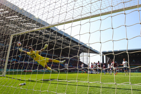 BIRMINGHAM, ENGLAND - MAY 13: Fraser Forster of Tottenham Hotspur fails to stop the 2nd goal scored by Douglas Luiz of Aston Villa during the Premier League match between Aston Villa and Tottenham Hotspur at Villa Park on May 13, 2023 in Birmingham, United Kingdom.