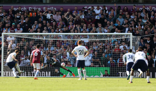 Aston Villa's Argentinian goalkeeper Emiliano Martinez (C) concedes a goal as Tottenham Hotspur's English striker Harry Kane (L) kicks and scores a penalty during the English Premier League football match between Aston Villa and Tottenham Hotspur at Villa Park in Birmingham, central England on May 13, 2023. (Photo by Adrian DENNIS / AFP) / RESTRICTED TO EDITORIAL USE. No use with unauthorized audio, video, data, fixture lists, club/league logos or 'live' services. Online in-match use limited to 120 images. An additional 40 images may be used in extra time. No video emulation. Social media in-match use limited to 120 images. An additional 40 images may be used in extra time. No use in betting publications, games or single club/league/player publications. / 