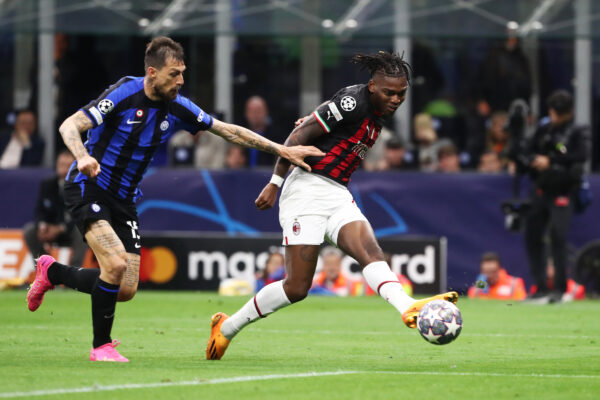 MILAN, ITALY - MAY 16: Rafael Leao of AC Milan controls the ball whilst under pressure from Francesco Acerbi of FC Internazionale during the UEFA Champions League semi-final second leg match between FC Internazionale and AC Milan at Stadio Giuseppe Meazza on May 16, 2023 in Milan, Italy. 