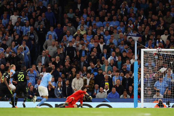 MANCHESTER, ENGLAND - MAY 17: Erling Haaland of Manchester City hits the crossbar during the UEFA Champions League semi-final second leg match between Manchester City FC and Real Madrid at Etihad Stadium on May 17, 2023 in Manchester, England. 