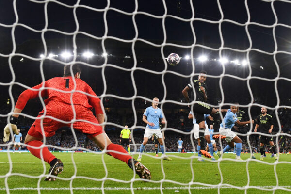 MANCHESTER, ENGLAND - MAY 17: Eder Militao of Real Madrid scores an own goal, Manchester City's third goal during the UEFA Champions League semi-final second leg match between Manchester City FC and Real Madrid at Etihad Stadium on May 17, 2023 in Manchester, England. 