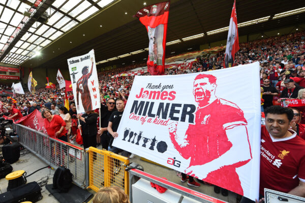 Tribute banners to Liverpool's Brazilian striker Roberto Firmino and Liverpool's English midfielder James Milner are pictured ahead of the English Premier League football match between Liverpool and Aston Villa at Anfield in Liverpool, north west England on May 20, 2023. (Photo by PETER POWELL / AFP) / RESTRICTED TO EDITORIAL USE. No use with unauthorized audio, video, data, fixture lists, club/league logos or 'live' services. Online in-match use limited to 120 images. An additional 40 images may be used in extra time. No video emulation. Social media in-match use limited to 120 images. An additional 40 images may be used in extra time. No use in betting publications, games or single club/league/player publications. / 