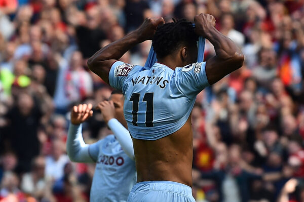 Aston Villa's English striker Ollie Watkins (R) reacts after reacts after failing to score from the penalty spot during the English Premier League football match between Liverpool and Aston Villa at Anfield in Liverpool, north west England on May 20, 2023. (Photo by PETER POWELL / AFP) / RESTRICTED TO EDITORIAL USE. No use with unauthorized audio, video, data, fixture lists, club/league logos or 'live' services. Online in-match use limited to 120 images. An additional 40 images may be used in extra time. No video emulation. Social media in-match use limited to 120 images. An additional 40 images may be used in extra time. No use in betting publications, games or single club/league/player publications. / 