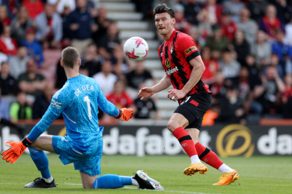 Manchester United's Spanish goalkeeper David de Gea (L) blocks a shot on goal by Bournemouth's Welsh striker Kieffer Moore during the English Premier League football match between Bournemouth and Manchester United at the Vitality Stadium in Bournemouth, southern England on May 20, 2023. (Photo by Adrian DENNIS / AFP) / RESTRICTED TO EDITORIAL USE. No use with unauthorized audio, video, data, fixture lists, club/league logos or 'live' services. Online in-match use limited to 120 images. An additional 40 images may be used in extra time. No video emulation. Social media in-match use limited to 120 images. An additional 40 images may be used in extra time. No use in betting publications, games or single club/league/player publications. / 