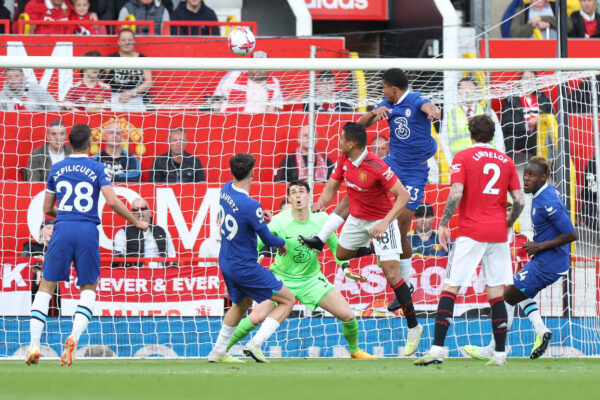 MANCHESTER, ENGLAND - MAY 25: Casemiro of Manchester United scores the team's first goal past Kepa Arrizabalaga of Chelsea during the Premier League match between Manchester United and Chelsea FC at Old Trafford on May 25, 2023 in Manchester, England. 
