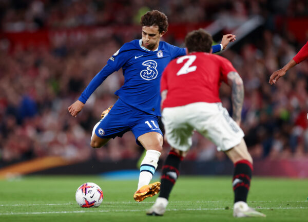 MANCHESTER, ENGLAND - MAY 25: Joao Felix of Chelsea scores the team's first goal during the Premier League match between Manchester United and Chelsea FC at Old Trafford on May 25, 2023 in Manchester, England. 