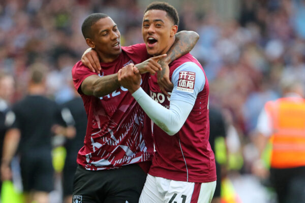 Aston Villa's English defender Ashley Young (L) and Aston Villa's English midfielder Jacob Ramsey (R) celebrate on the final whistle in the English Premier League football match between Aston Villa and Brighton and Hove Albion at Villa Park in Birmingham, central England on May 28, 2023. Villa won the game 2-1. (Photo by Geoff Caddick / AFP) / RESTRICTED TO EDITORIAL USE. No use with unauthorized audio, video, data, fixture lists, club/league logos or 'live' services. Online in-match use limited to 120 images. An additional 40 images may be used in extra time. No video emulation. Social media in-match use limited to 120 images. An additional 40 images may be used in extra time. No use in betting publications, games or single club/league/player publications. / 