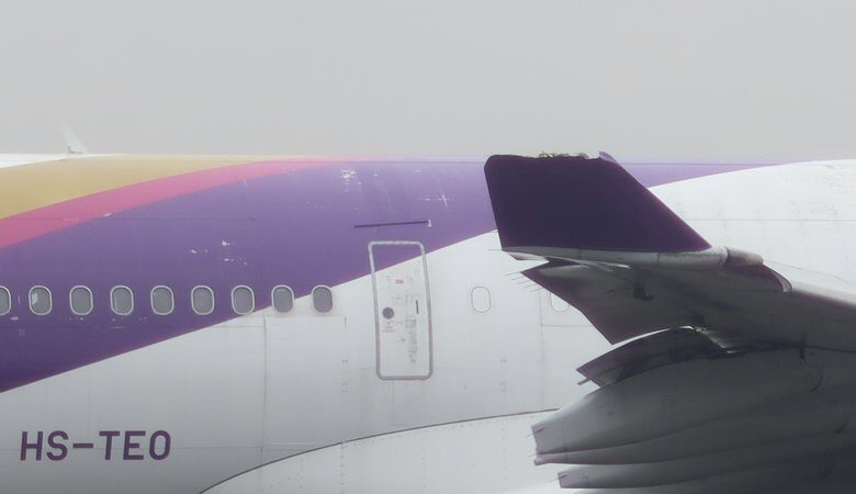 长荣、泰航在日本羽田机场擦撞 机翼破损关闭1条跑道