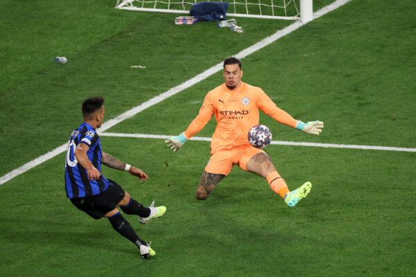 ISTANBUL, TURKEY - JUNE 10: Ederson of Manchester City makes a save from Lautaro Martinez of FC Internazionale during the UEFA Champions League 2022/23 final match between FC Internazionale and Manchester City FC at Atatuerk Olympic Stadium on June 10, 2023 in Istanbul, Turkey. 