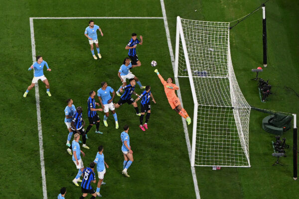 Manchester City's Brazilian goalkeeper #31 Ederson dives to make a save in the closing minutes of the UEFA Champions League final football match between Inter Milan and Manchester City at the Ataturk Olympic Stadium in Istanbul, on June 10, 2023. Manchester City won the match 1-0. (Photo by Ozan KOSE / AFP) 