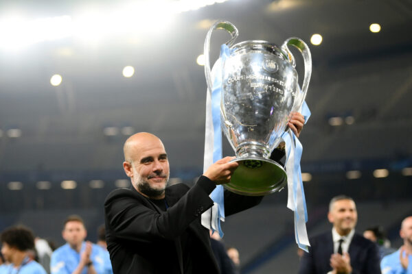 ISTANBUL, TURKEY - JUNE 10: Pep Guardiola, Manager of Manchester City, celebrates with the UEFA Champions League trophy after the team's victory in the UEFA Champions League 2022/23 final match between FC Internazionale and Manchester City FC at Atatuerk Olympic Stadium on June 10, 2023 in Istanbul, Turkey. 