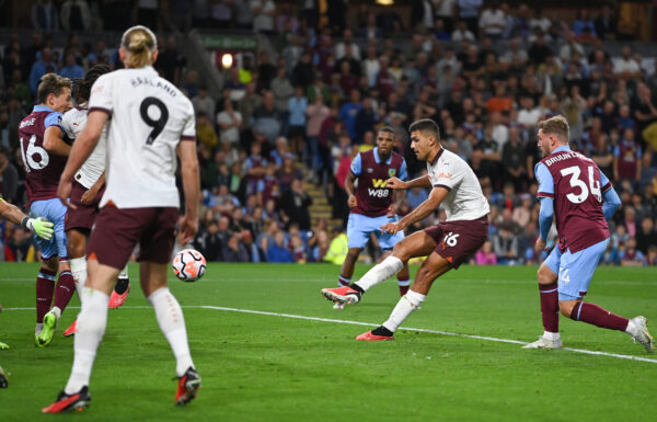 BURNLEY, ENGLAND - AUGUST 11: Rodri of Manchester City scores the team's third goal during the Premier League match between Burnley FC and Manchester City at Turf Moor on August 11, 2023 in Burnley, England. 