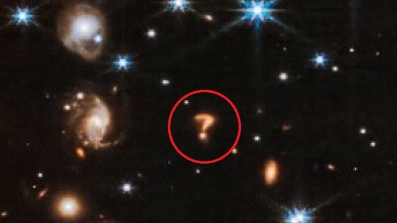 NASA拍摄年轻恒星 问号状神秘天体入镜