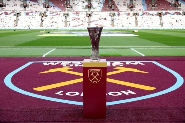 LONDON, ENGLAND - AUGUST 20: The UEFA Europa Conference League trophy is displayed on a plinth prior to the Premier League match between West Ham United and Chelsea FC at London Stadium on August 20, 2023 in London, England. 