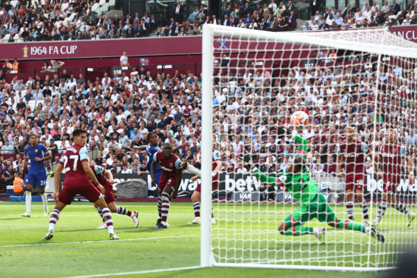 LONDON, ENGLAND - AUGUST 20: Carney Chukwuemeka of Chelsea scores the team's first goal during the Premier League match between West Ham United and Chelsea FC at London Stadium on August 20, 2023 in London, England. 