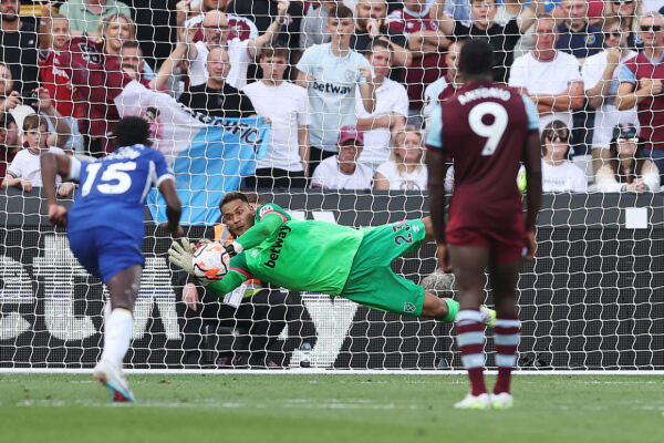 LONDON, ENGLAND - AUGUST 20: Alphonse Areola of West Ham United saves a penalty from Enzo Fernandez of Chelsea (not pictured) during the Premier League match between West Ham United and Chelsea FC at London Stadium on August 20, 2023 in London, England. 