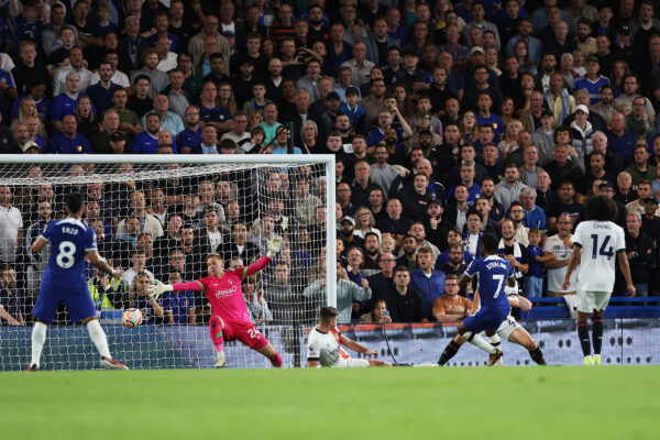 LONDON, ENGLAND - AUGUST 25: Thomas Kaminski of Luton Town fails to save as Raheem Sterling of Chelsea scores his team's second goal during the Premier League match between Chelsea FC and Luton Town at Stamford Bridge on August 25, 2023 in London, England. (Photo by Eddie Keogh/Getty Images)