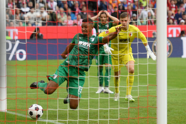 MUNICH, GERMANY - AUGUST 27: Felix Uduokhai of FC Augsburg scores an own goal during the Bundesliga match between FC Bayern M眉nchen and FC Augsburg at Allianz Arena on August 27, 2023 in Munich, Germany. 