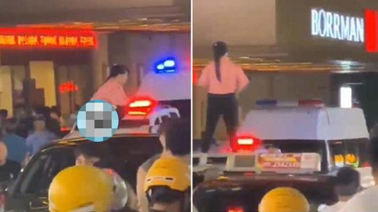 桂林女跳上警車車頂小便 網民：正是地方
